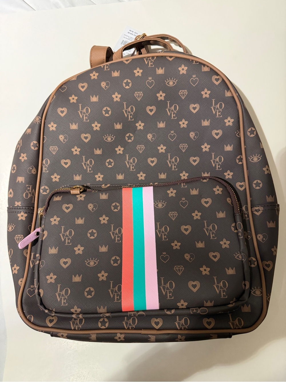Claire's Brown Monogram Backpack with Purple Tag